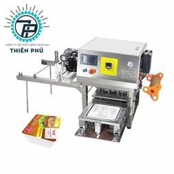 Máy dán miệng hộp tự động có in date